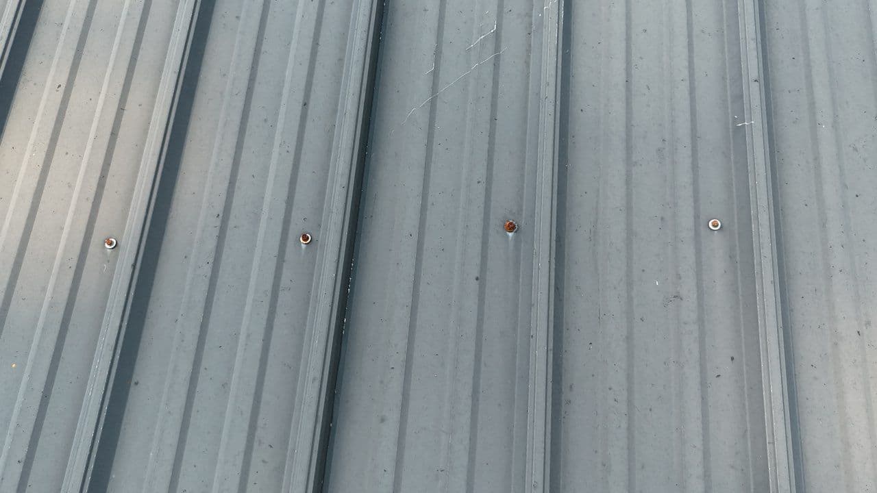 Essential Metal Roof Maintenance for Longevity and Appeal image